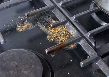 Removing burnt grease and carbon build-up